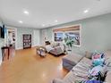 Spacious living room with comfortable seating and hardwood floors at 1522 Inland Ave, Charleston, SC 29412