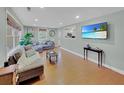 Bright living room featuring hardwood floors and comfortable seating at 1522 Inland Ave, Charleston, SC 29412