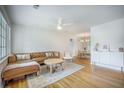 Bright and airy living room featuring hardwood floors, modern furniture, and an open layout at 2010 Culver Ave, Charleston, SC 29407