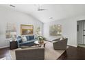 Stylish living room showcases hardwood floors, ample natural light, and comfortable seating at 2021 Arundel Pl, Mount Pleasant, SC 29464