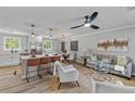 Modern living space showcases an open floor plan, a kitchen, and comfortable seating at 346 Horseshoe Rd, Moncks Corner, SC 29461