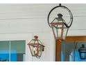 Close-up of stylish lanterns illuminating the front porch, enhancing the home's curb appeal at 759 Maynard Ln, Summerville, SC 29486