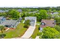 Aerial view of a home in a well-developed community with mature trees at 828 Williamsburg Ln, Charleston, SC 29414