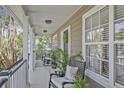 Inviting porch features comfortable seating and charming decor, providing a cozy outdoor living space at 1985 Shields Ln, Mount Pleasant, SC 29466