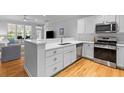 Modern kitchen with stainless steel appliances, quartz countertops, and open layout great for entertaining at 2948 Treadwell Street St, Mount Pleasant, SC 29466