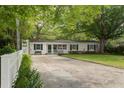 Quaint single-story home with a well-maintained front yard and a cozy, inviting entrance at 344 Lantana Dr, Charleston, SC 29407
