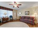 Cozy living room featuring a ceiling fan, plush seating, and a warm, inviting atmosphere at 344 Lantana Dr, Charleston, SC 29407