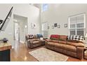 Bright living room with hardwood floors, tall ceilings, and neutral tones throughout at 3901 Poplar Grove Pl, Summerville, SC 29483