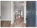 Inviting foyer with light gray walls and beautiful wood flooring at 7780 Montview Rd, North Charleston, SC 29418