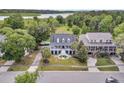 An aerial view showcasing this elegant home near a lake and a community park at 1711 Indigo Island Dr, Hanahan, SC 29410