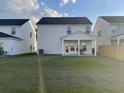 Spacious backyard offering ample outdoor living space and relaxing covered patio at 244 Tuscan Sun St, Summerville, SC 29485