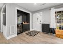 Inviting entryway with stylish wine fridge, modern furnishings, and ample natural light at 2864 Wofford Rd, Charleston, SC 29414