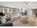 Bright and airy open-concept living room featuring a modern kitchen and comfortable seating at 2864 Wofford Rd, Charleston, SC 29414