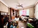 Inviting living room featuring a decorative fireplace, built-in shelving, and natural light at 3 Hanover St, Charleston, SC 29403