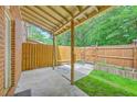 Enclosed back patio featuring a privacy fence and space for outdoor relaxation at 302 Springview Ln # 10, Summerville, SC 29485