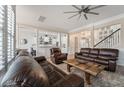 Spacious living room boasts an open layout with hardwood floors and staircase views at 3656 Spindrift Dr, Mount Pleasant, SC 29466