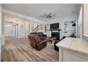 Bright living room features hardwood floors, ship lap accent wall and a cozy fireplace at 3656 Spindrift Dr, Mount Pleasant, SC 29466