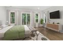 This main bedroom features neutral paint, windows to let in the natural light and hardwood floors at 5105 St George Ln, Hollywood, SC 29449