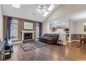Open living space with fireplace, skylights, and seamless flow to the kitchen, great for entertaining and Gathering time at 8451 Walsham St, North Charleston, SC 29420