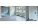 Bright living room featuring updated flooring, fresh paint, and natural light at 960 Savage Road Rd, Charleston, SC 29414