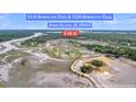 Stunning aerial view of the marsh front acreage on 5510 & 5520 Remington Trail, Johns Island, SC at 000 Remington Trl, Johns Island, SC 29455
