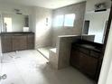 Bathroom with tiled shower, double vanities, and neutral color scheme at 120 Shingle Oak Dr, Moncks Corner, SC 29461