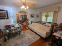Cozy living room featuring a decorative ceiling fan and lots of decor at 1259 Wisteria Rd, Charleston, SC 29407