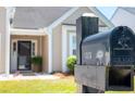 Close-up of the mailbox with address 1315 in front of the property with well-kept lawn at 1315 Palm Cove Dr, Charleston, SC 29492