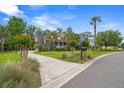 Beautiful home on a manicured lot with mature trees and a paved driveway at 1721 Bowline Dr, Mount Pleasant, SC 29466