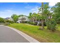 Charming home situated on a well-manicured lawn with mature trees and shrubbery at 1721 Bowline Dr, Mount Pleasant, SC 29466