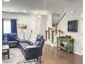 Comfortable living room featuring a staircase, stylish furniture, and a cozy atmosphere at 312 Silverdrop St, Goose Creek, SC 29445