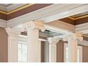 Detailed architectural features highlighting decorative columns and crown molding, showcasing exquisite craftsmanship at N Blvd, Mount Pleasant, SC 29464