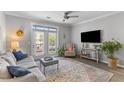 Cozy living room with neutral tones, stylish furniture, and a welcoming atmosphere at 130 River Landing Dr # 3202, Charleston, SC 29492