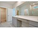 Bright bathroom with a vanity, large mirror, and walk-in closet at 1423 Clay Field Trl, Summerville, SC 29485