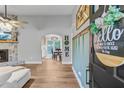 Welcoming entryway featuring wood-look floors and inviting decor at 309 Kingbird Rd, Ladson, SC 29456