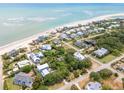 An aerial view of a beachfront community with beach access and beautiful landscaping at 3109 Ion Ave, Sullivans Island, SC 29482