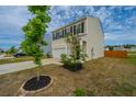 Corner lot house with a one car garage, well maintained lawn and recently planted tree at 430 Pender Woods Dr, Summerville, SC 29486
