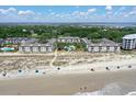 Beachfront condos offer stunning views, easy beach access, and a refreshing pool at 9000 Palmetto Dr # C104, Isle of Palms, SC 29451