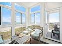 Relaxing sunroom with great views of the coastline at 216 W Arctic Ave # 9, Folly Beach, SC 29439