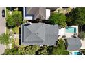 Overhead view of home showing roof, landscaping, and pool, showcasing backyard oasis at 2449 Daniel Island Dr, Daniel Island, SC 29492