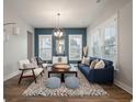 Stylish living room with ample natural light, creating a warm and inviting atmosphere at 4129 Maidstone Dr, Mount Pleasant, SC 29466