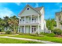 Charming two-story home with a spacious porch and landscaped front yard at 122 Foxglove Ave, Summerville, SC 29483