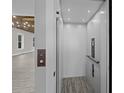 Accessible home elevator with modern design, enhancing convenience and accessibility at 1327 Wood Sorrel Dr, Moncks Corner, SC 29461