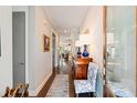 Inviting foyer with hardwood floors, elegant decor, and a view into the living spaces, showing the open floor plan at 3726 Orion Ln, Mount Pleasant, SC 29466