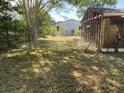 View of the backyard of a property in need of renovation, showing potential at 650 Atlantic St, Mount Pleasant, SC 29464
