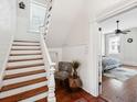 Bright stairway entrance that leads to a bedroom at 66 Beaufain St, Charleston, SC 29401