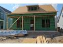 New construction home with wood sheathing, window framing, and under construction dormer at 822 Gentle Breeze Dr, Summerville, SC 29486