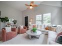 Cozy living room with high ceilings, comfortable seating, and plenty of natural light at 1224 Midvale Ave, Charleston, SC 29412