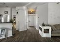 Bright entryway with wood flooring, white walls, and a view into other areas of the house at 1317 Wild Olive Dr, Mount Pleasant, SC 29464