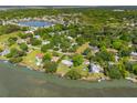 Expansive aerial view showcasing the charming neighborhood and serene waterways at 1467 Battalion Dr, James Island, SC 29412
